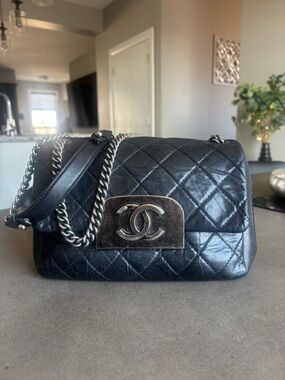 CHANEL Black Quilted Calfskin square Shoulder Bag with Silver-Tone CC Plate